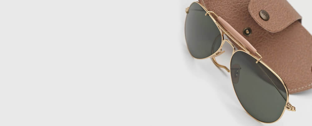 qual oculos de sol combina com rosto redondo - imagem de óculos e carteira